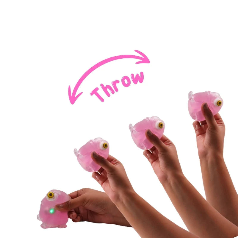 Buy 1 get 1 free Stick-i-dgets (Purple) Color-Changing Squishy Toy that glows and pops!