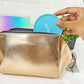 Bewitching Gold Makeup Pouch - Perfect for on the go!